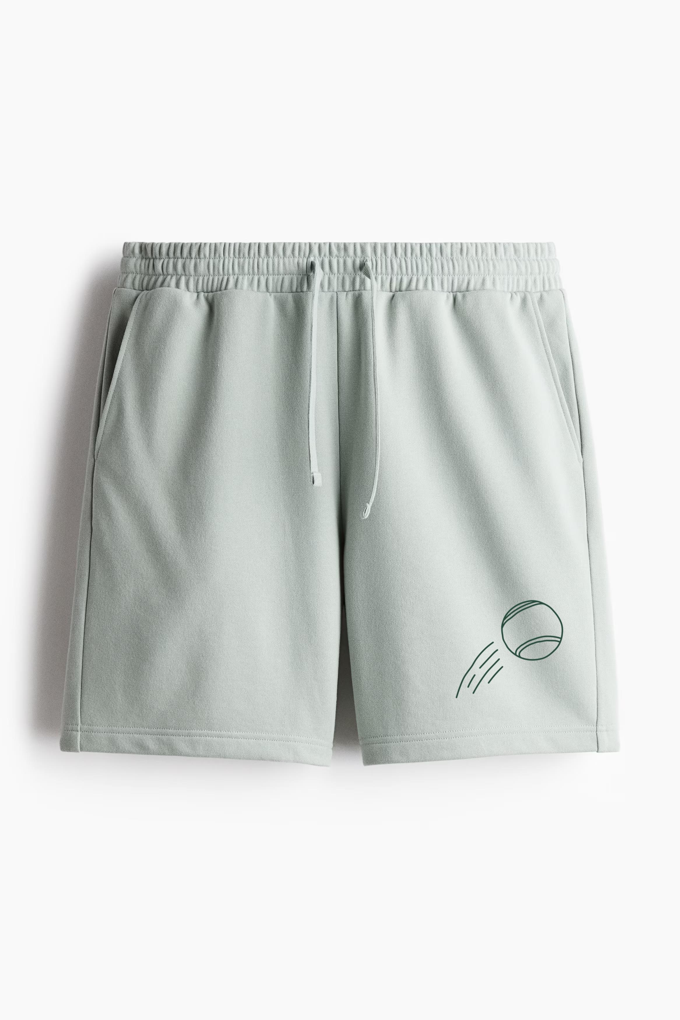 Tennis Ball With Motion Lines Behind Relaxed-Fit Shorts